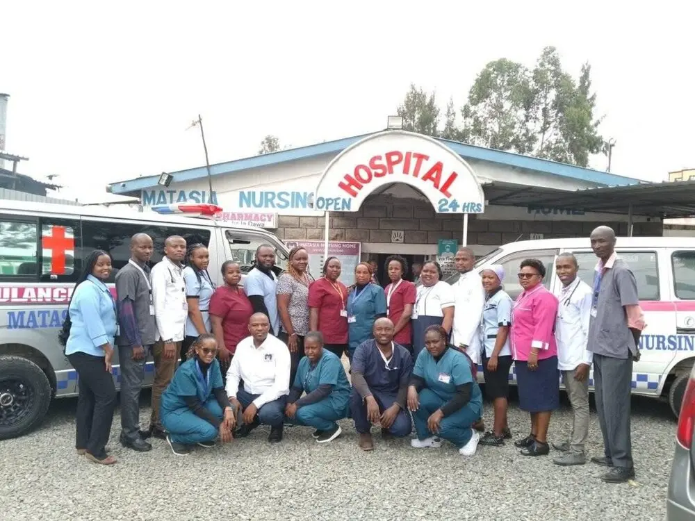 The Matasia Nursing Home team outside the hospital entrance in Ngong
