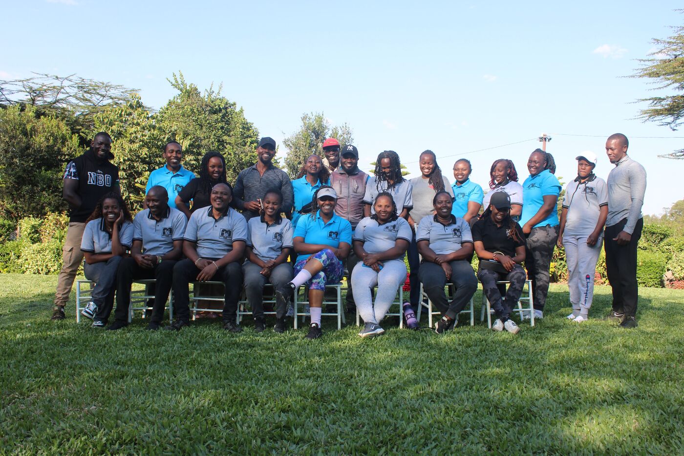 The Matasia Nursing Home team gathered outdoors on the lawn